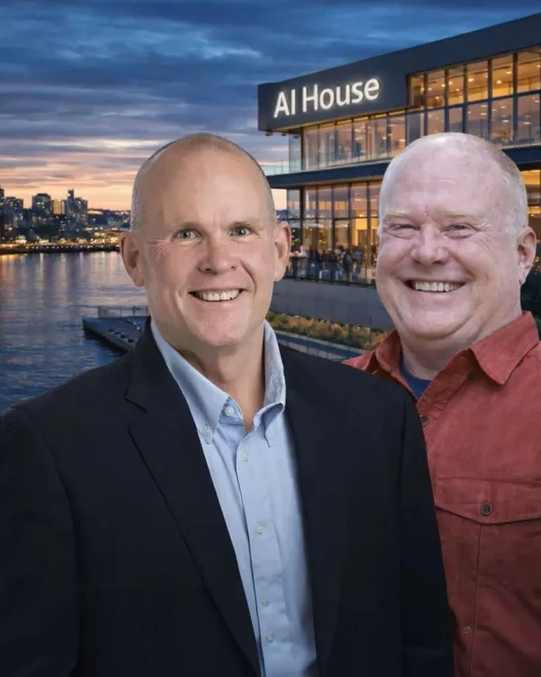 Bob Rapp, on the left in a blazer, and Ken Johnston, on the right in a red shirt, together at AI House.